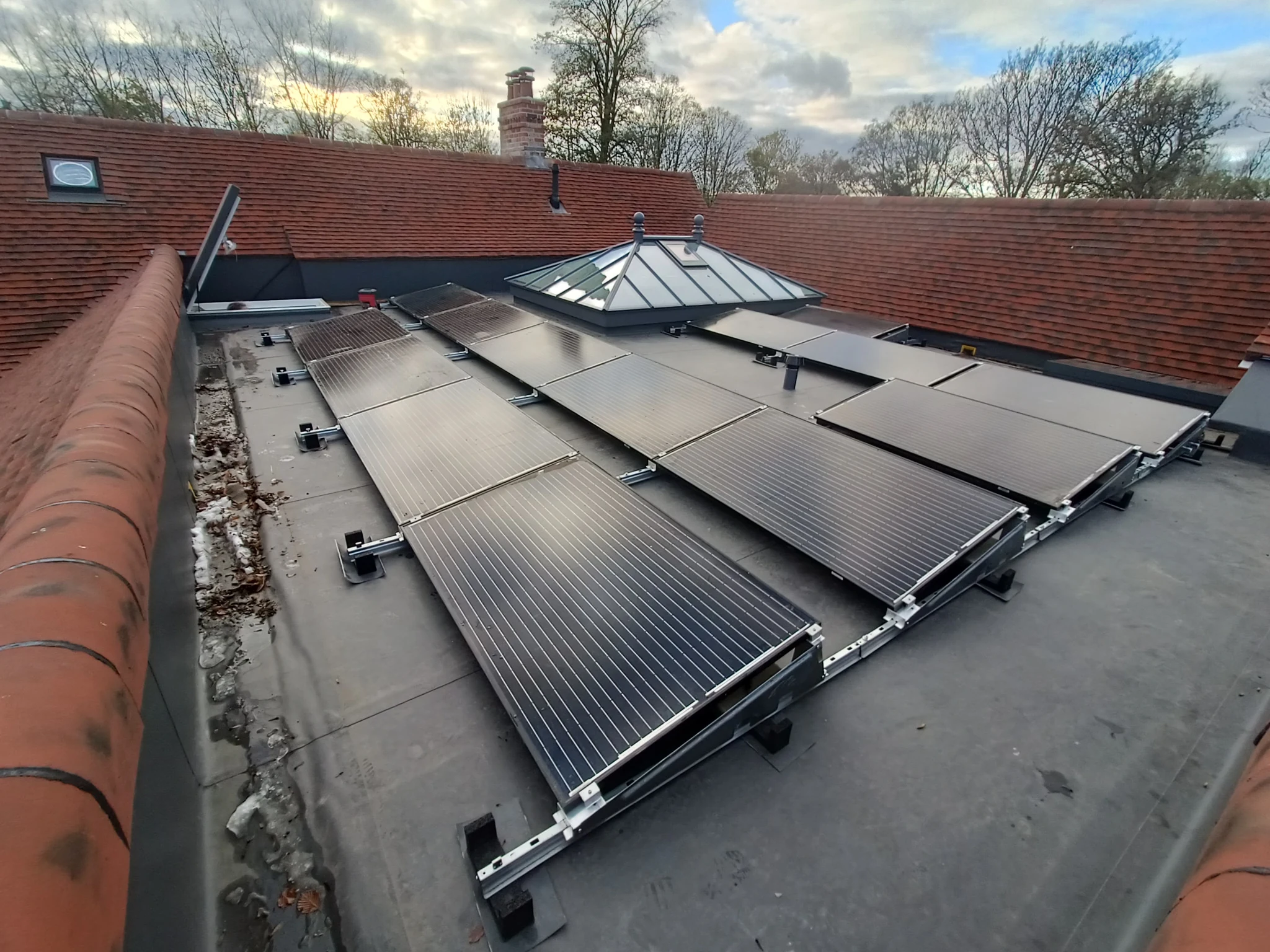 Completed redeployed solar PV array on a flat roof near Alton